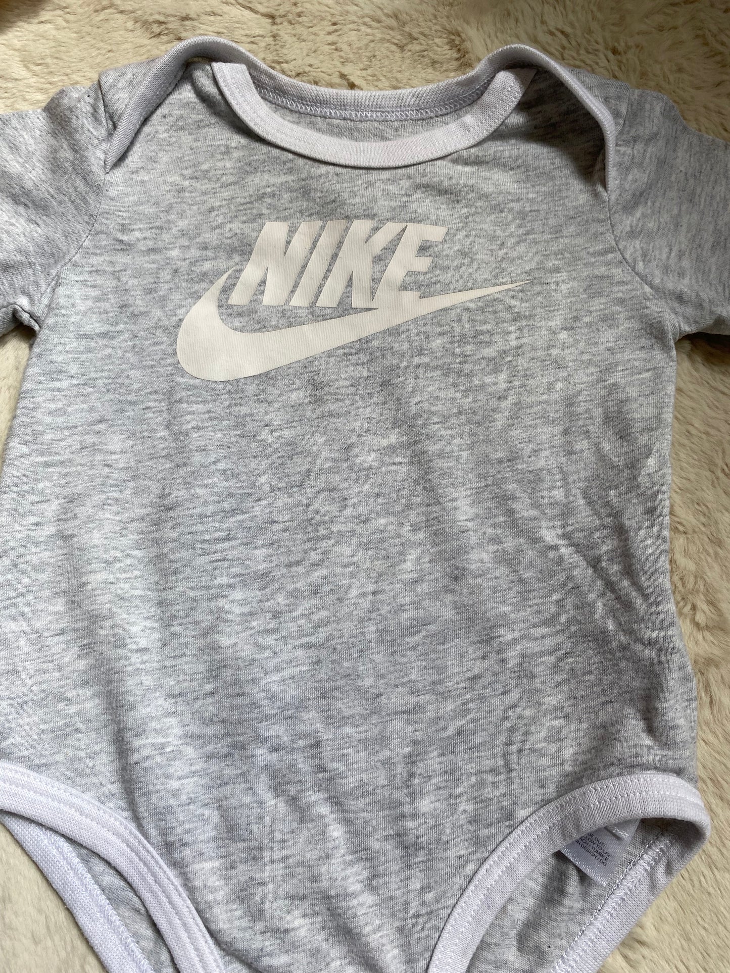 Bodie nike 0/6 mois