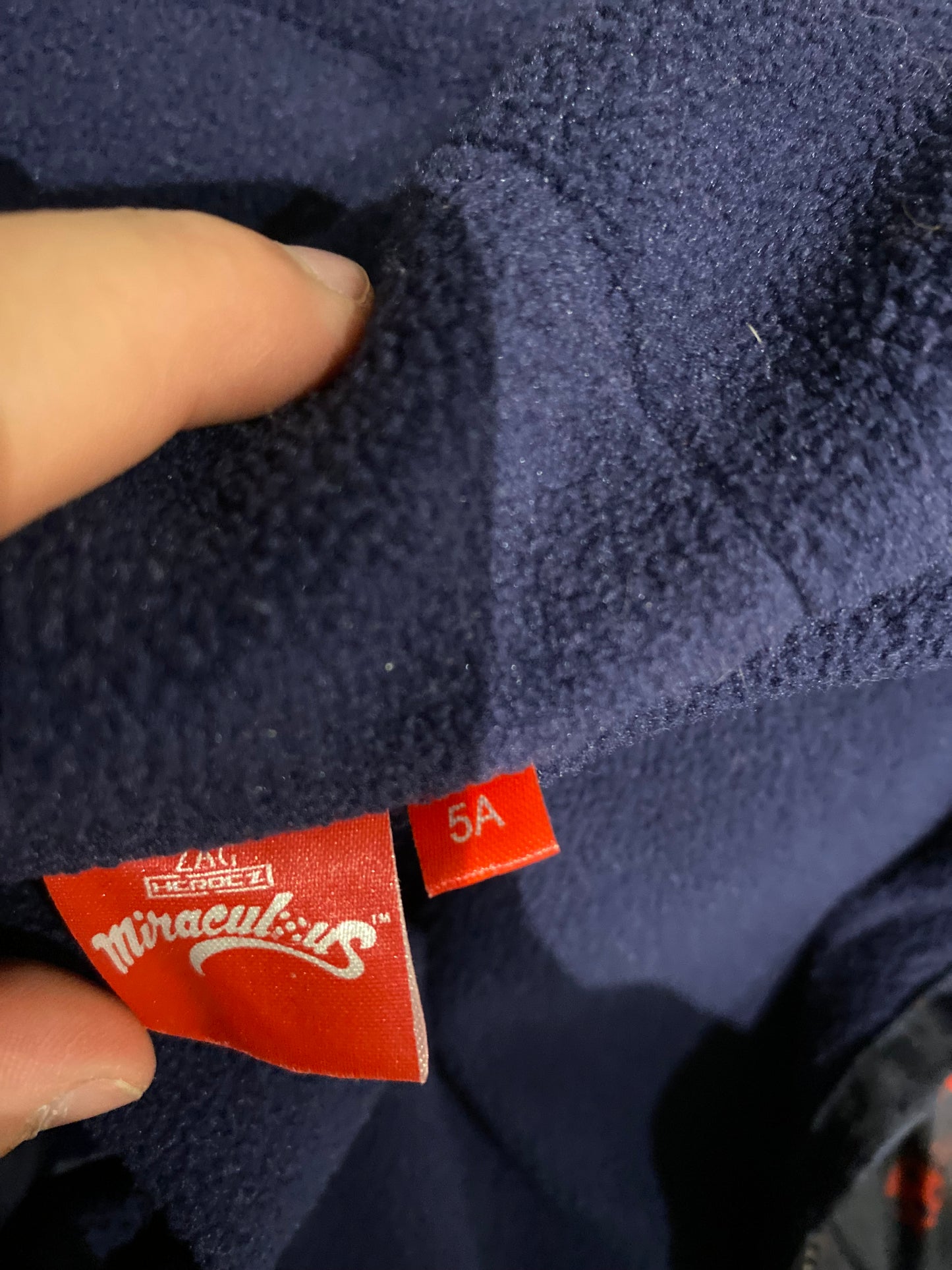 🌧️ K-way marine et rouge – Tissaia Miraculus – 5 ans