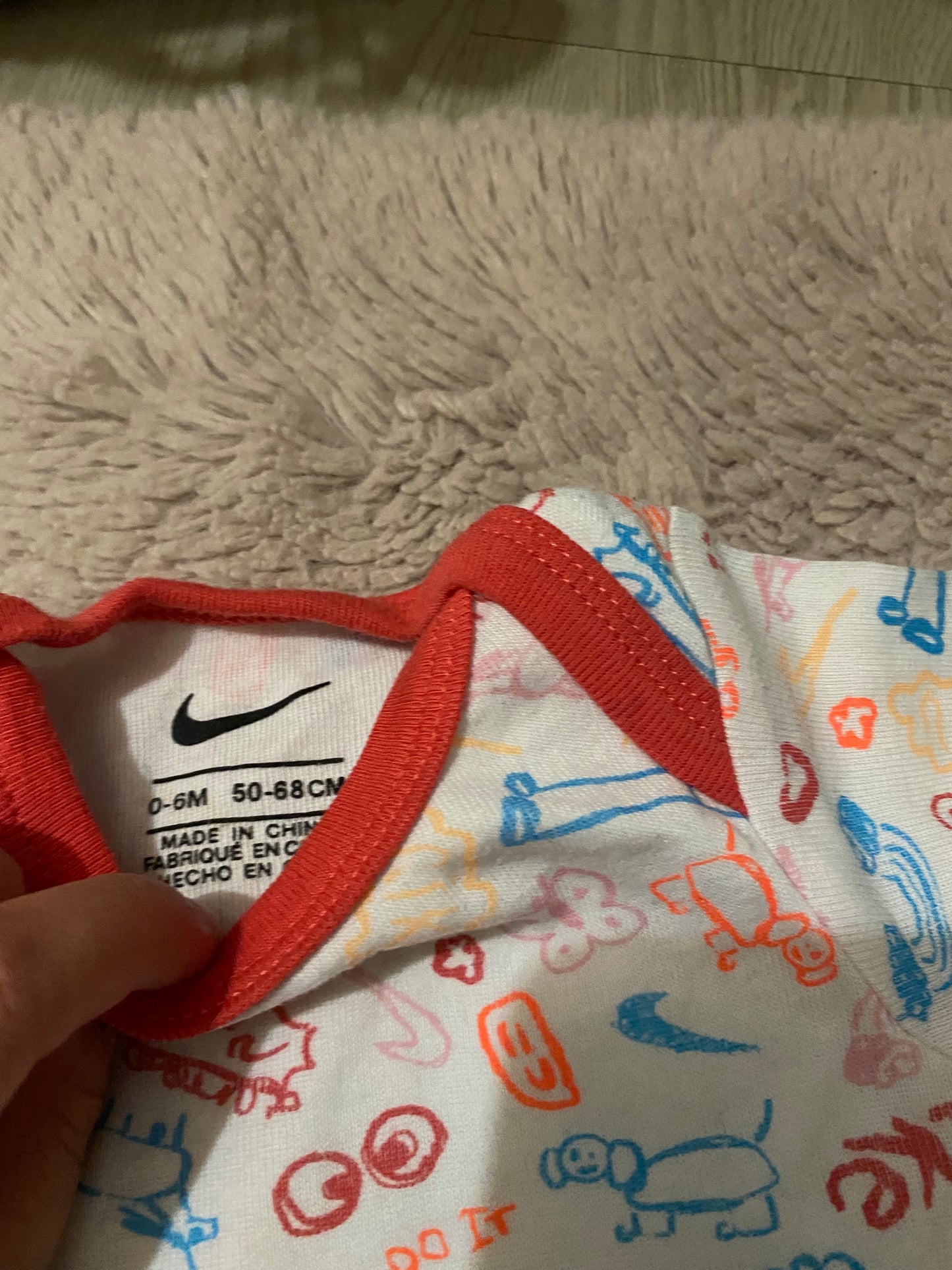 Lot 2 bodies Nike & Jordan – 3 et 6 mois – style sport