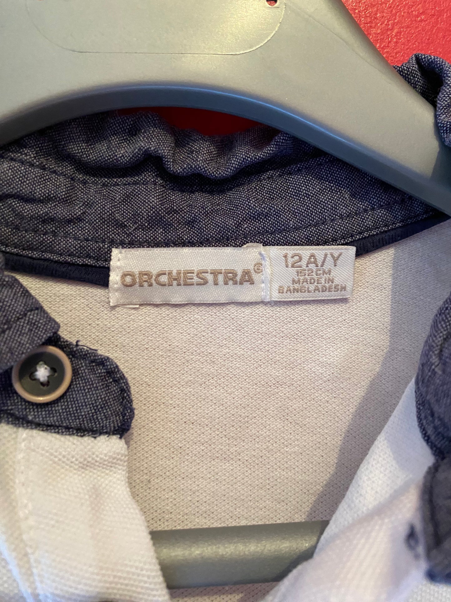 Polo blanc col et poches marine – Orchestra – 12 ans