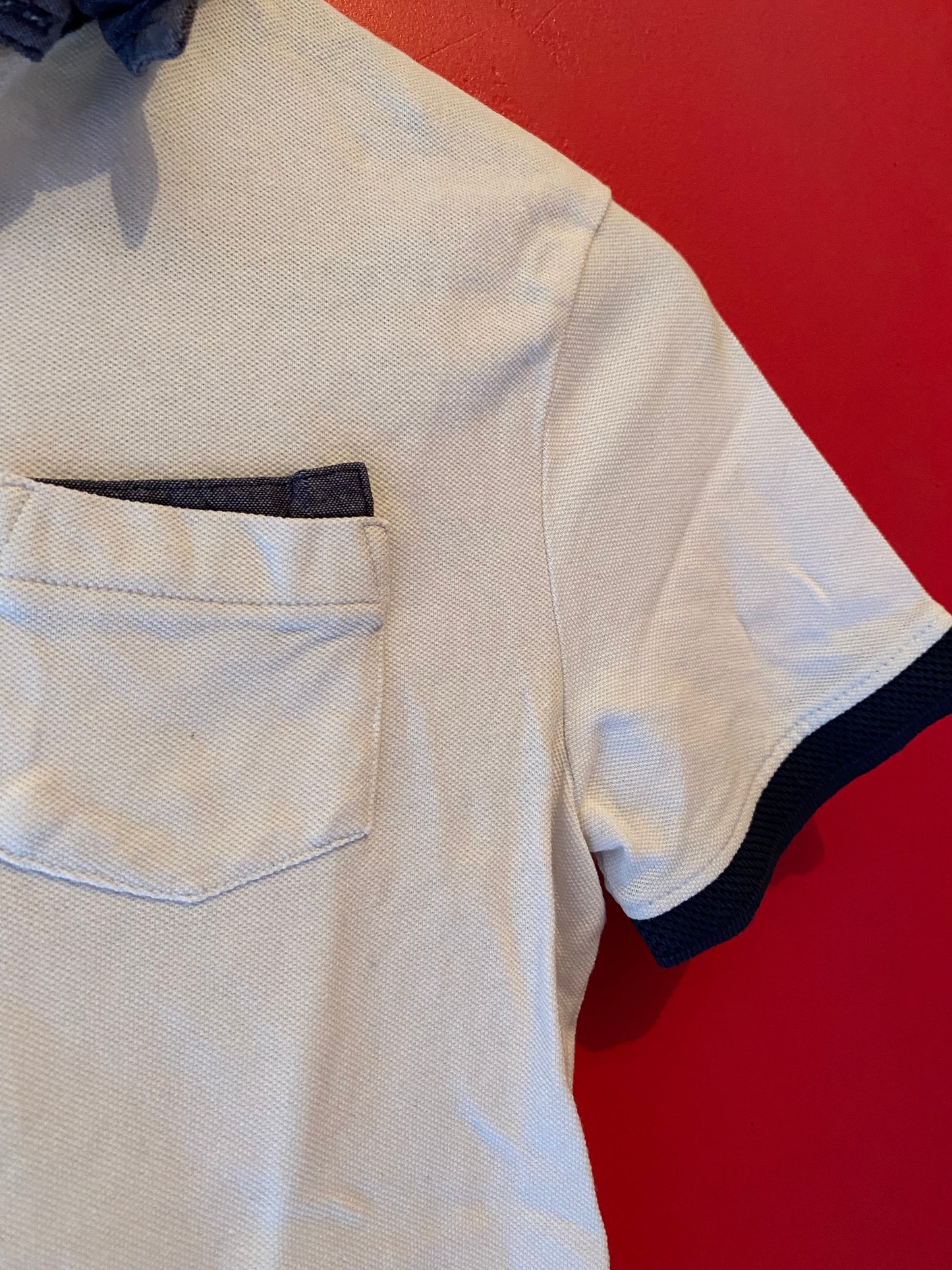 Polo blanc col et poches marine – Orchestra – 12 ans