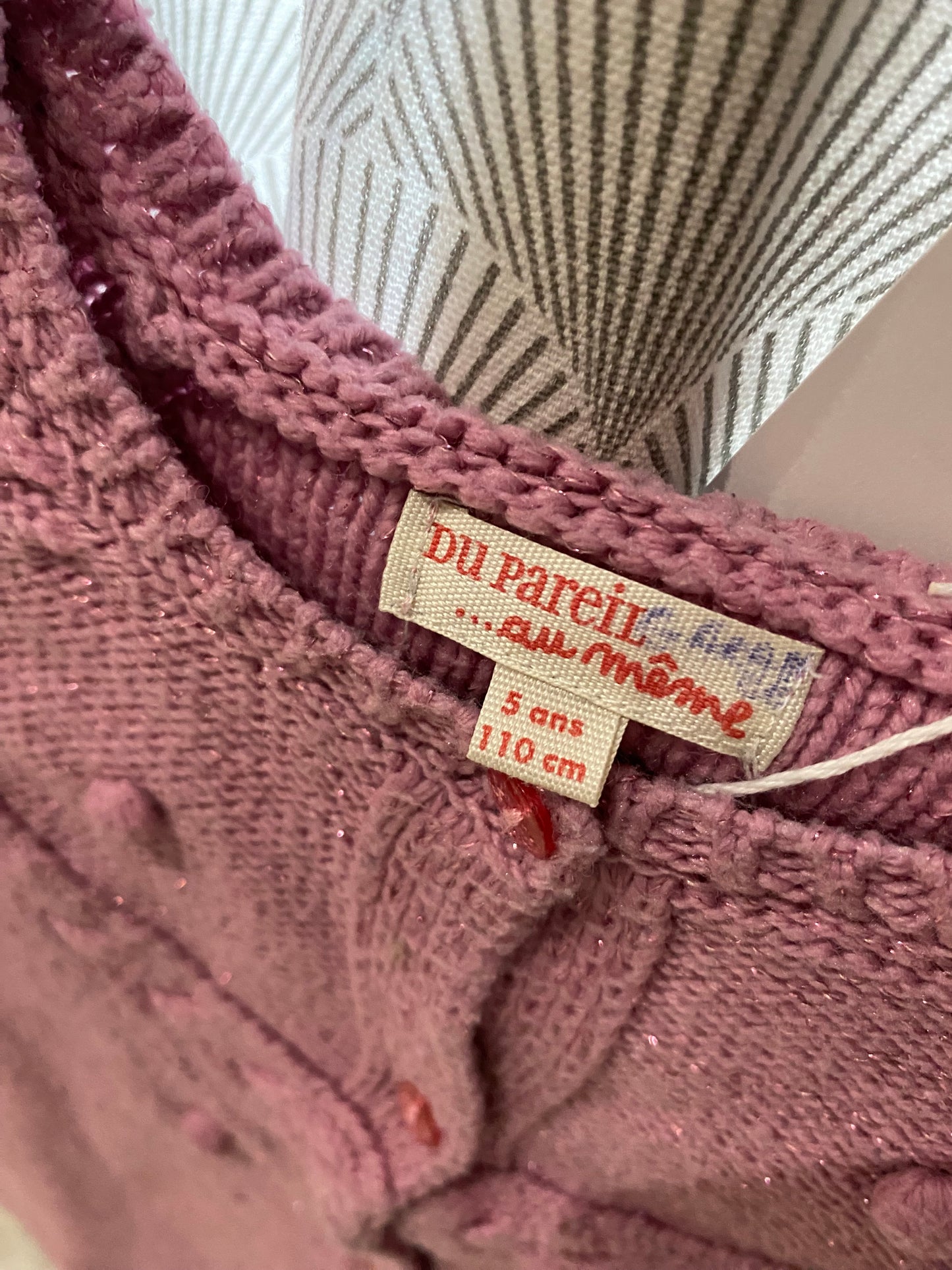 Gilet mauve décor pompons – 5 ans – DPAM
