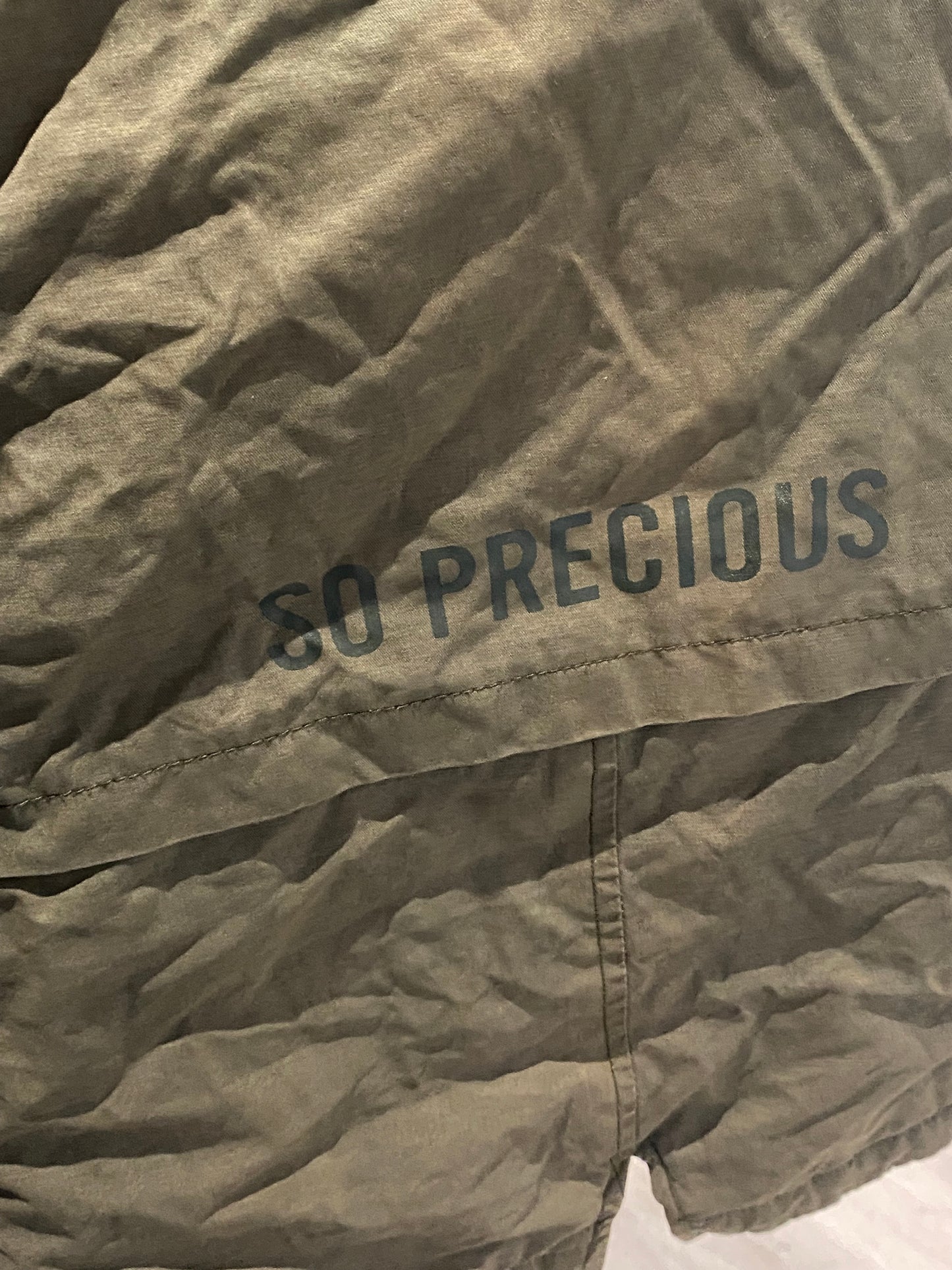 ❄️ Doudoune kaki intérieur moumoute – Kiabi – 5 ans